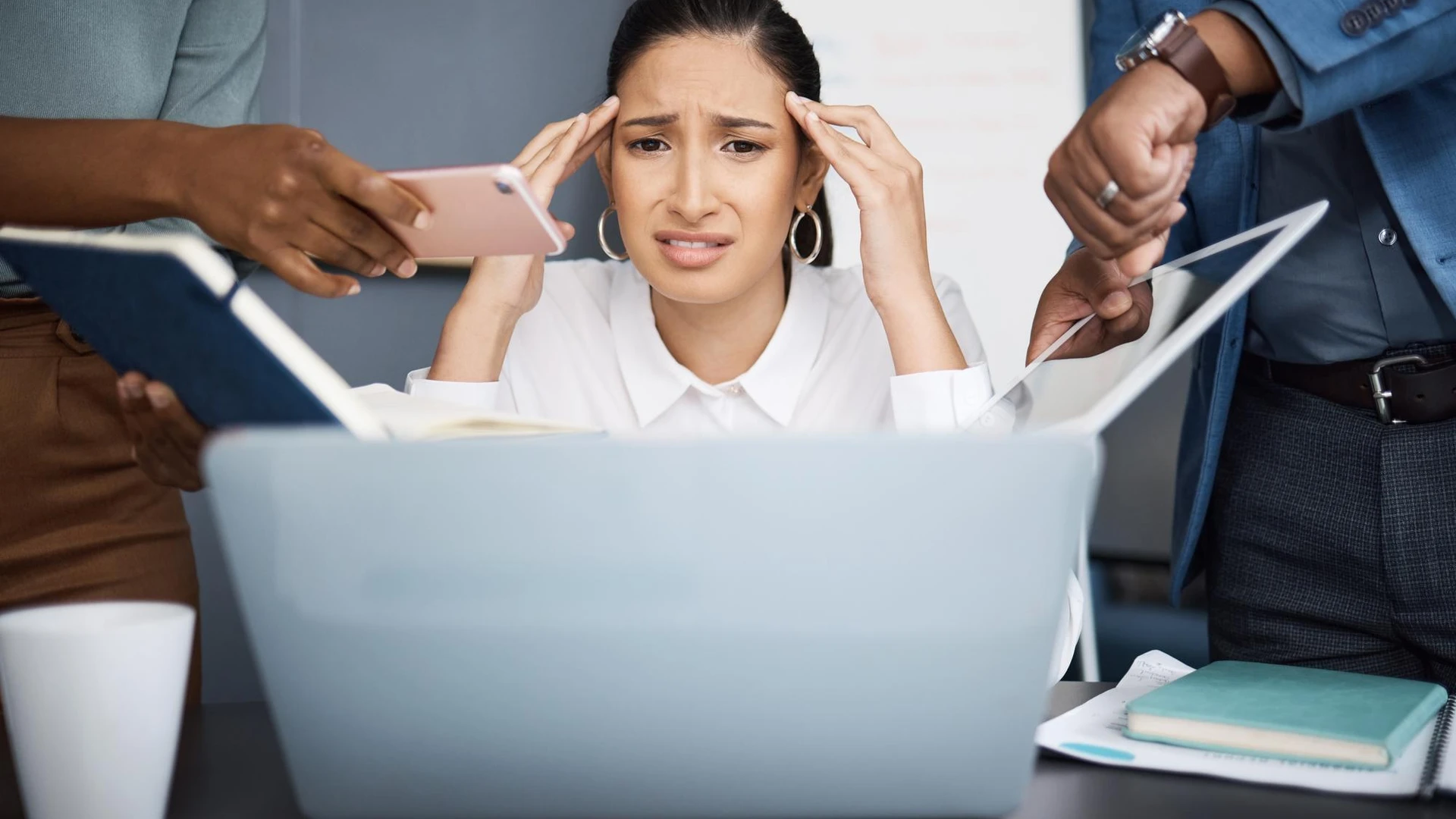 Stress multitasking and businesswoman with laptop in office with documents for approval for team Burnout chaos and female pub