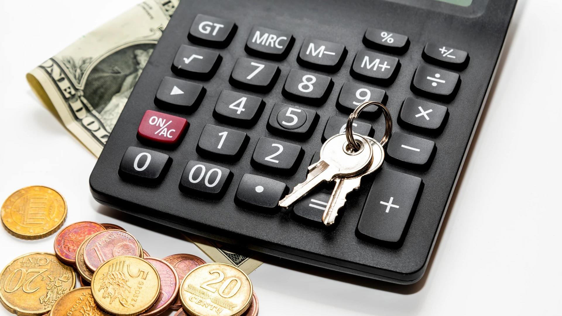Business, finance, saving money or car loan concept. Keys, coins stack, calculator on desk table